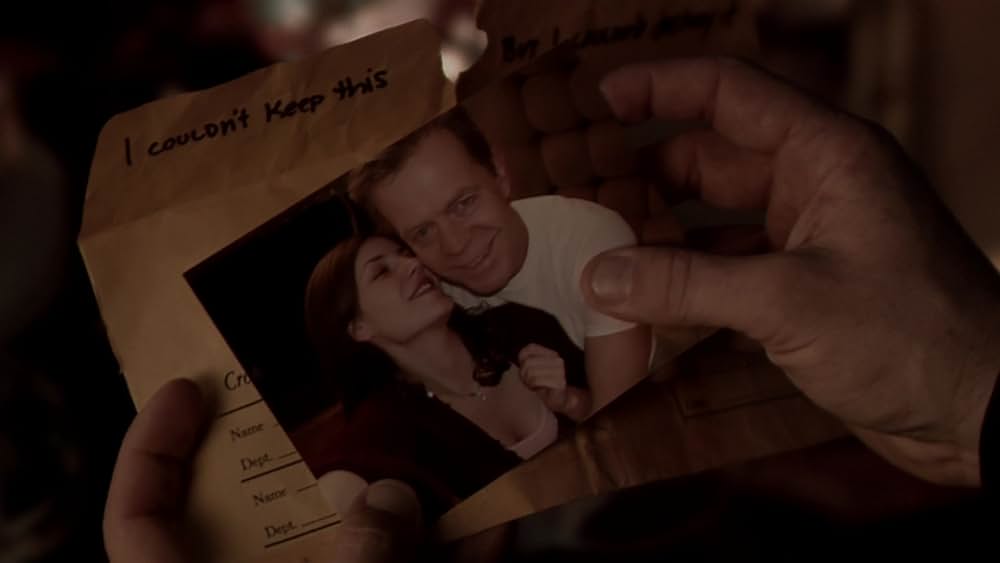 その男は、静かな隣人の画像