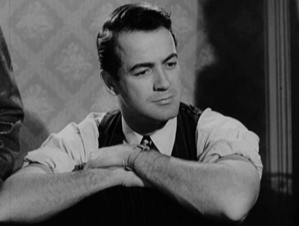 「情無用の街」Mark Stevensの画像