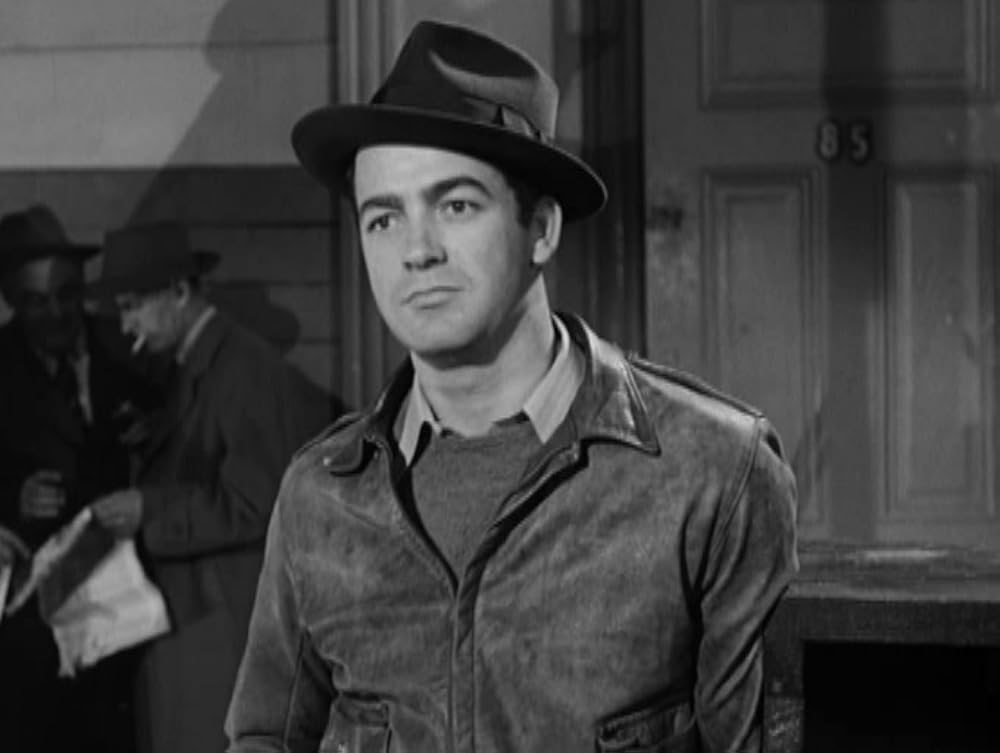 「情無用の街」Mark Stevensの画像