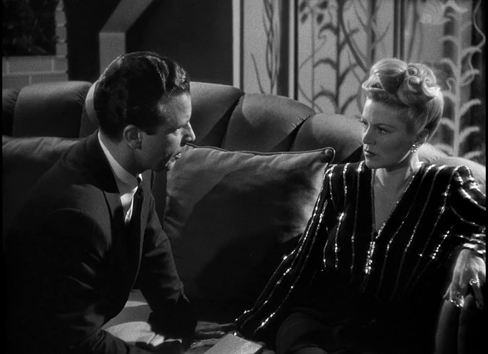 「ブロンドの殺人者」ディック・パウエル & クレア・トレバーの画像