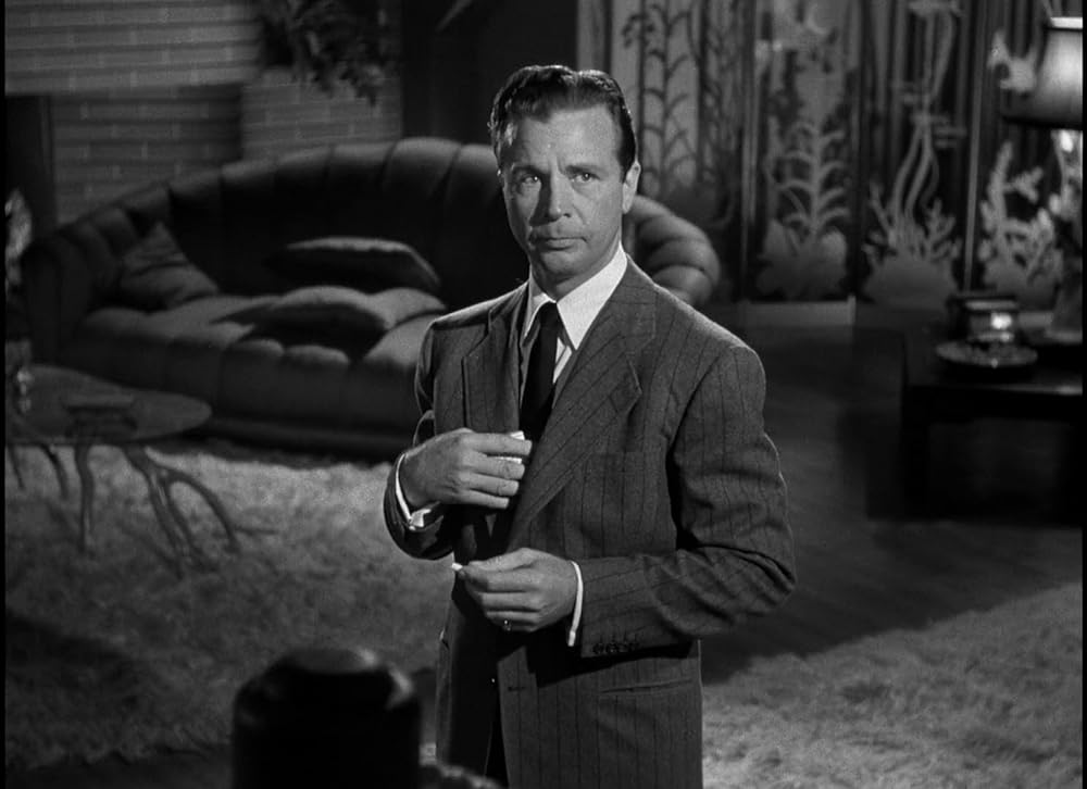 「ブロンドの殺人者」ディック・パウエルの画像