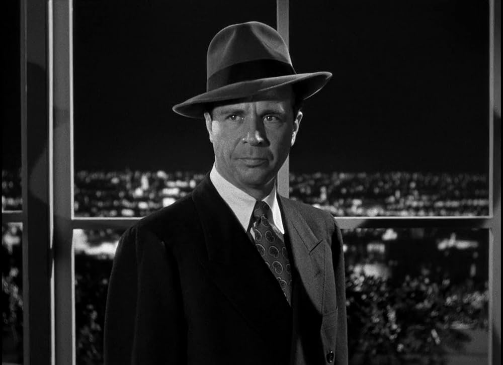 「ブロンドの殺人者」ディック・パウエルの画像