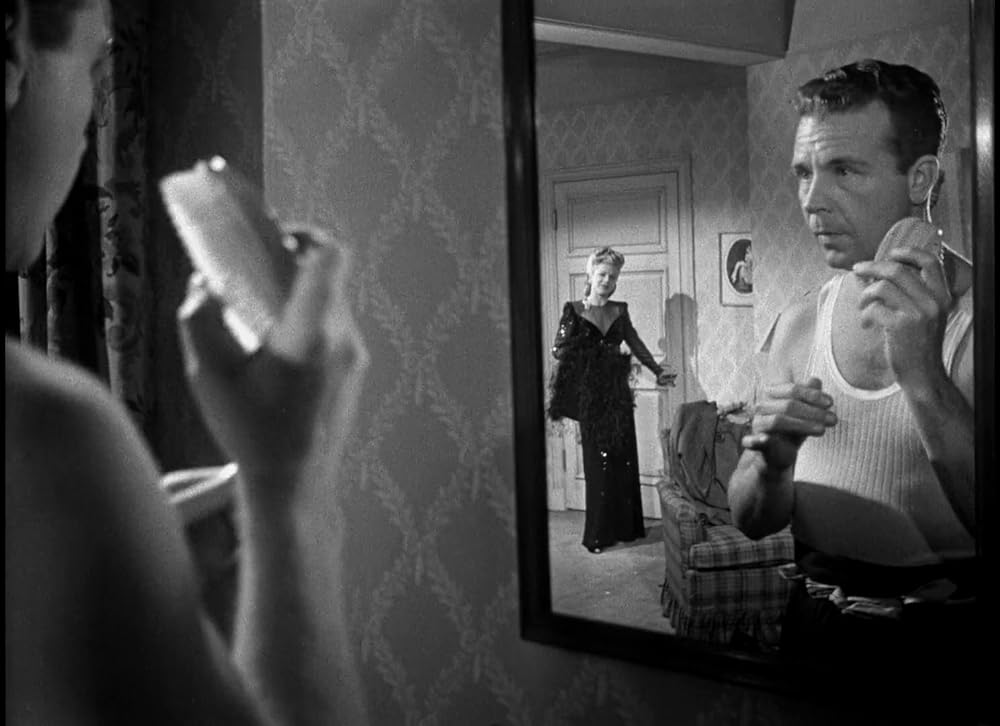 「ブロンドの殺人者」ディック・パウエル & クレア・トレバーの画像