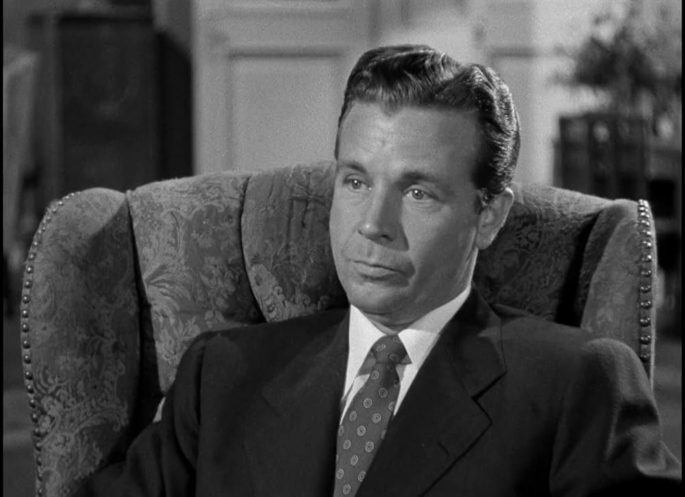 「ブロンドの殺人者」ディック・パウエルの画像