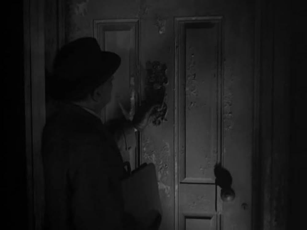 猫とカナリヤの画像