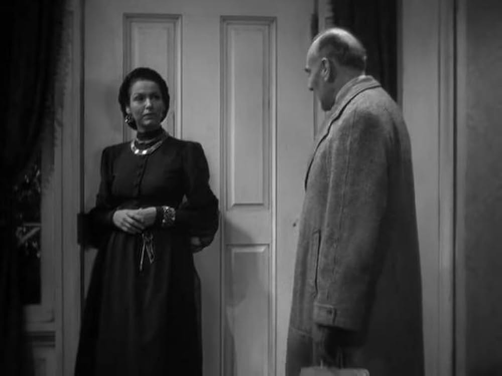 猫とカナリヤの画像