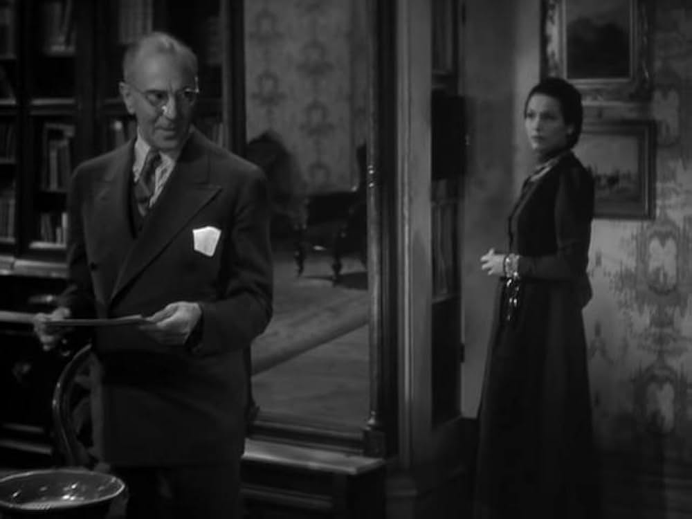 猫とカナリヤの画像