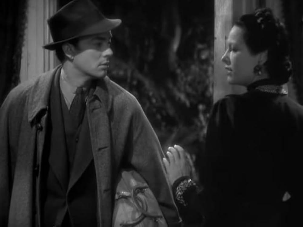 猫とカナリヤの画像