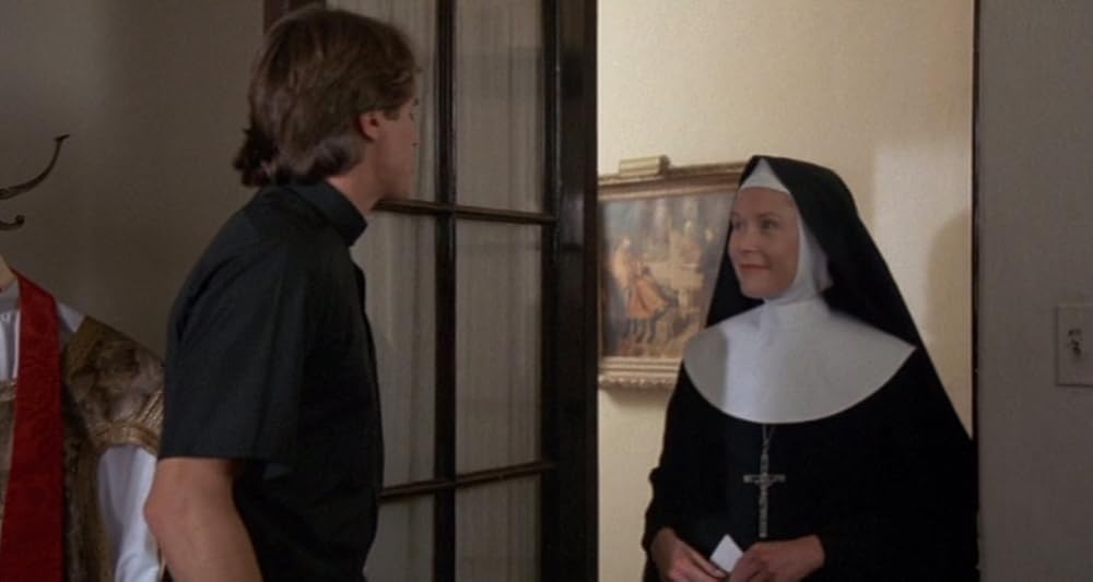 裸の十字架を持つ男／エクソシストフォーエバーの画像