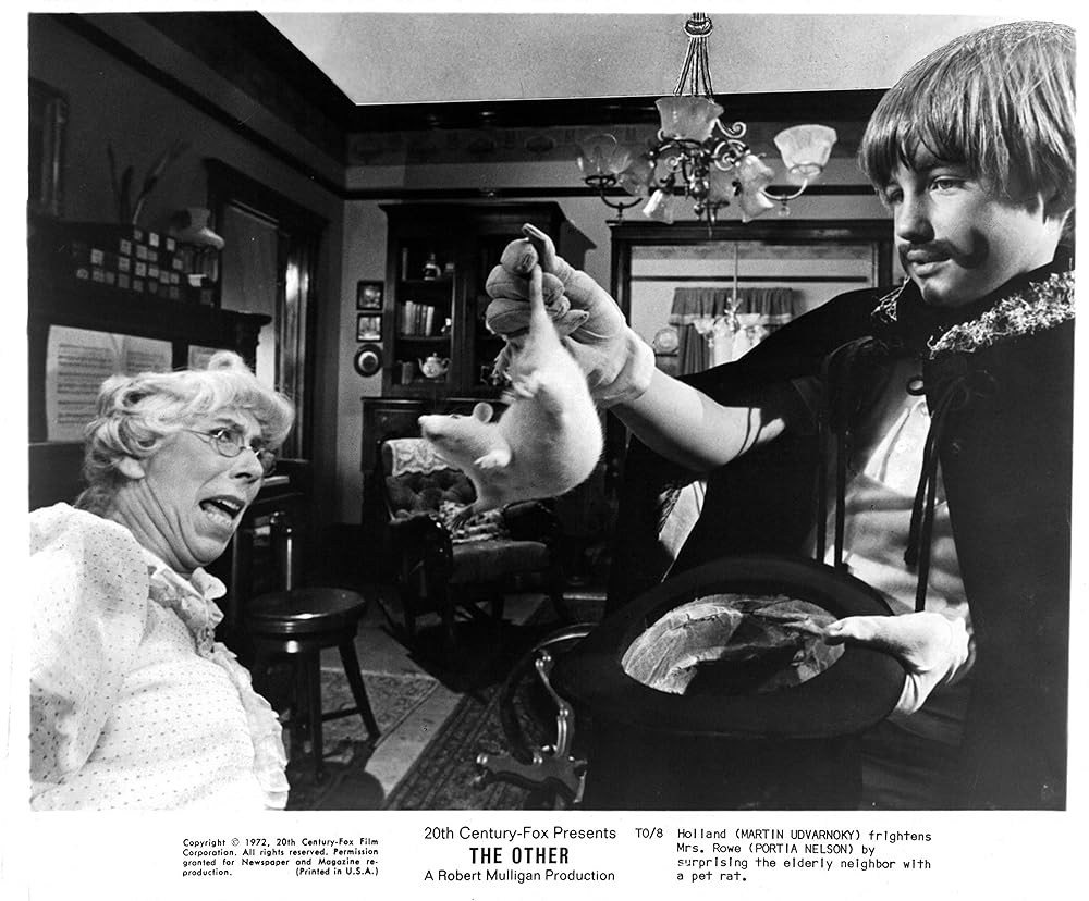 悪を呼ぶ少年の画像