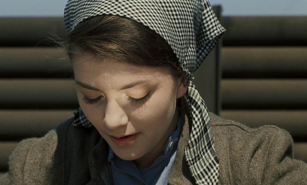 つながれたヒバリの写真