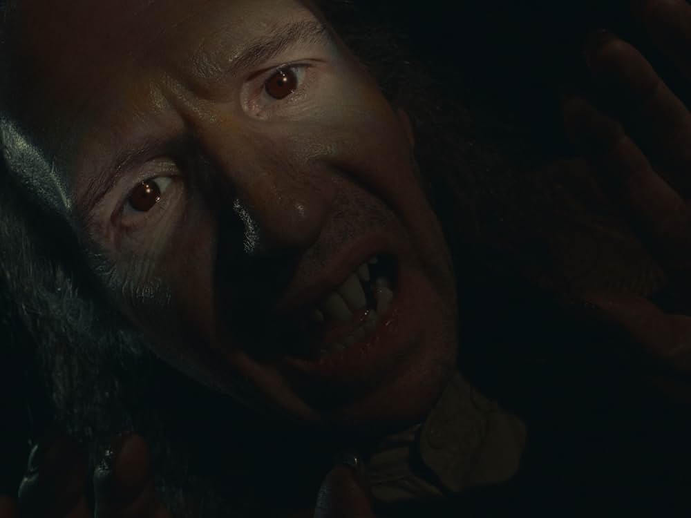 ネズミ捕りの男の画像