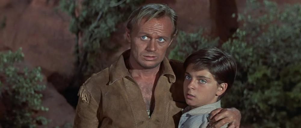 襲われた幌馬車の画像