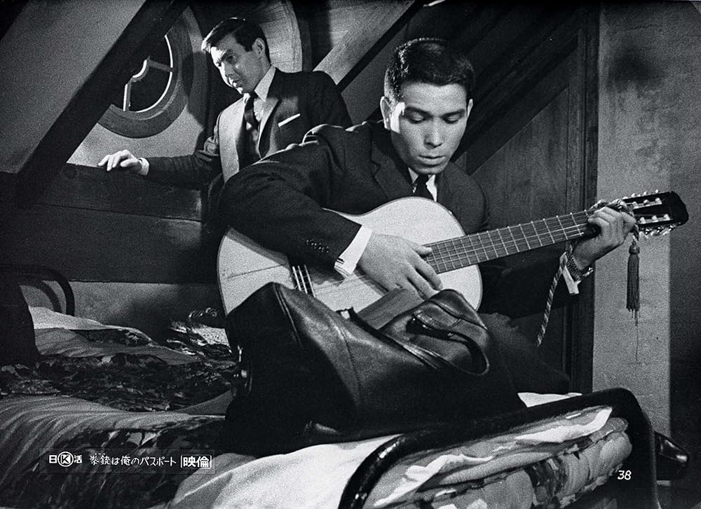 拳銃は俺のパスポートの画像