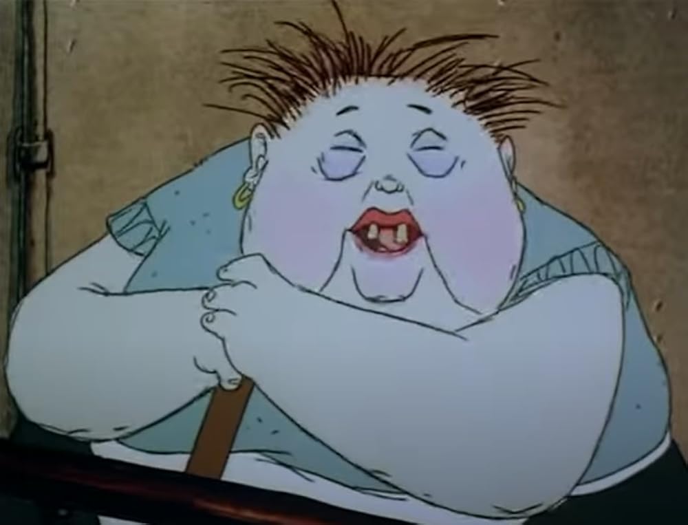 老婦人とハトの画像