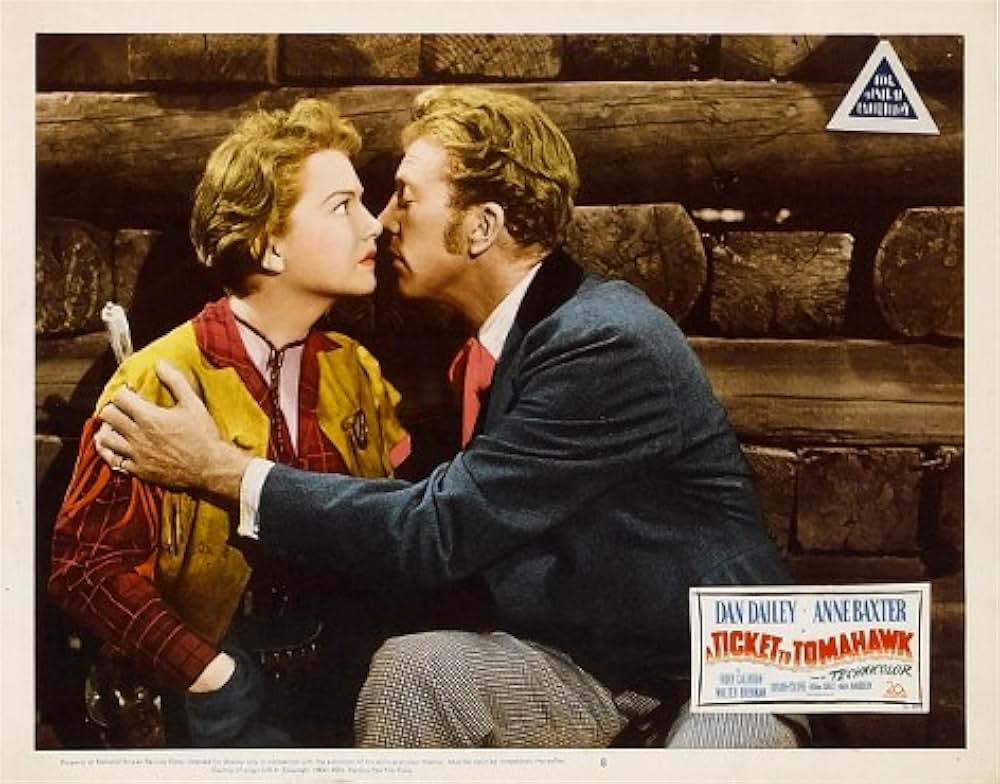 彼女は二挺拳銃の画像