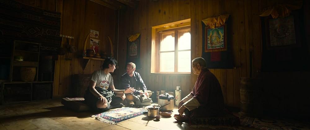 お坊さまと鉄砲の画像