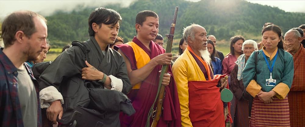 お坊さまと鉄砲の画像