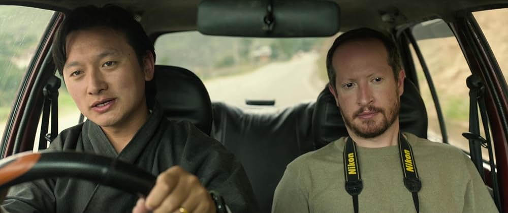 お坊さまと鉄砲の画像