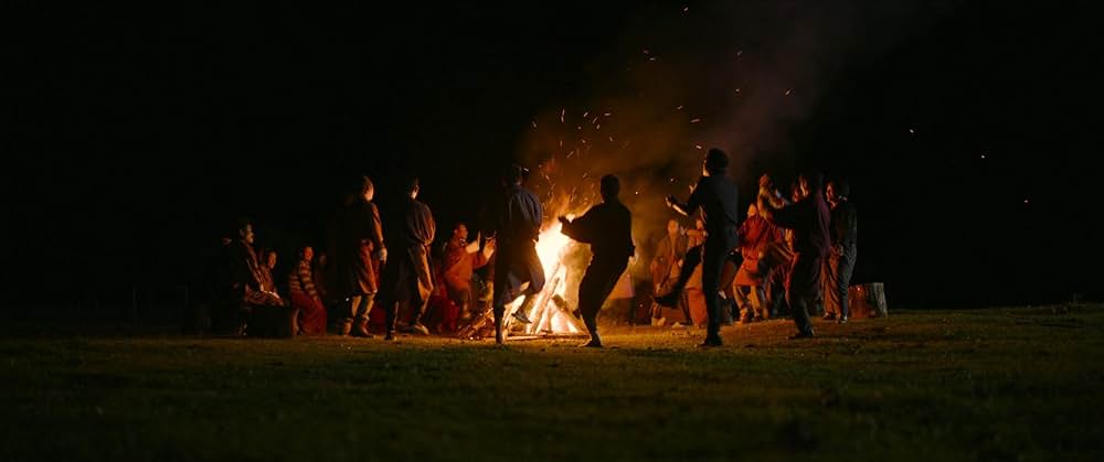 お坊さまと鉄砲の画像
