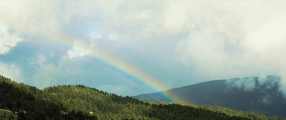 お坊さまと鉄砲の画像