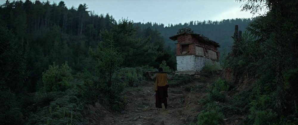 お坊さまと鉄砲の画像