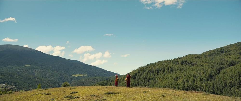 お坊さまと鉄砲の画像