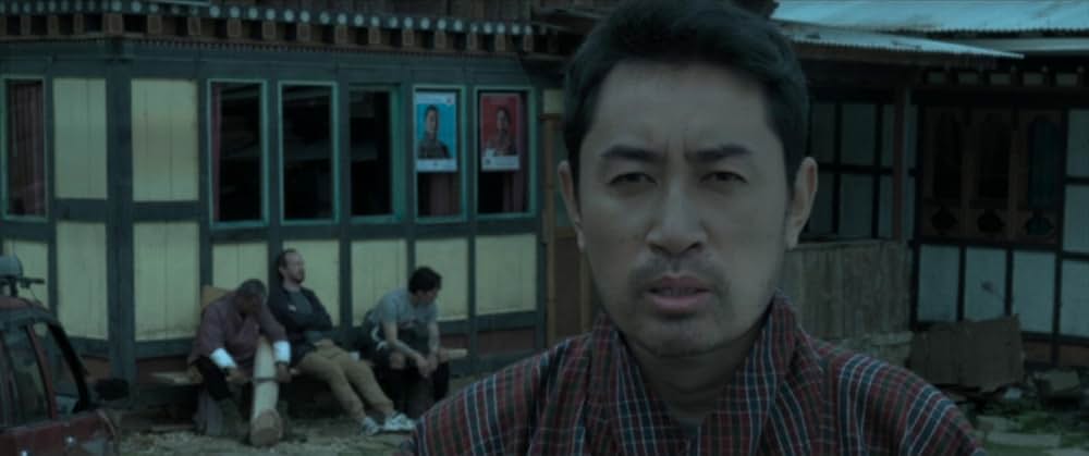 お坊さまと鉄砲の画像