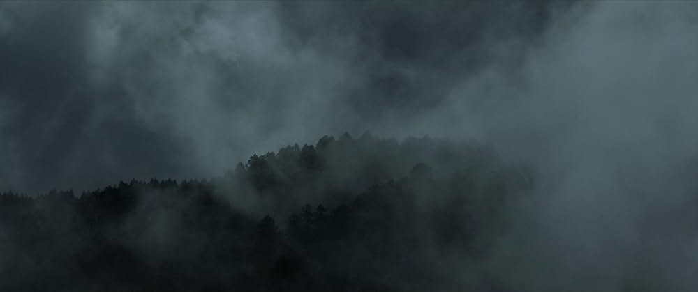 お坊さまと鉄砲の画像