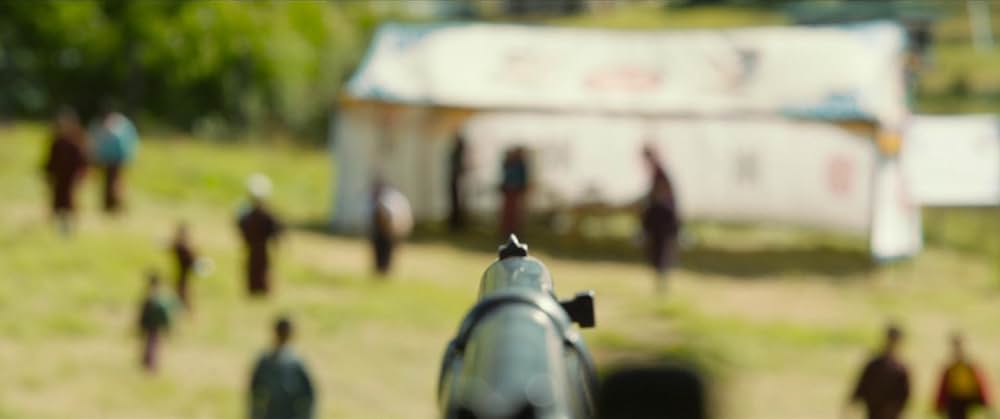 お坊さまと鉄砲の画像