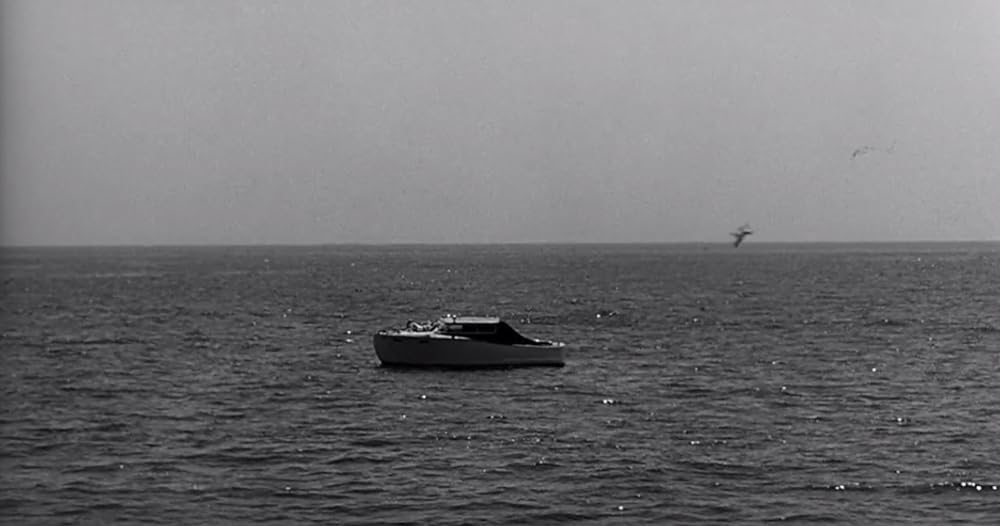 縮みゆく人間の画像