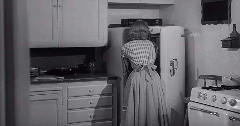 縮みゆく人間の画像