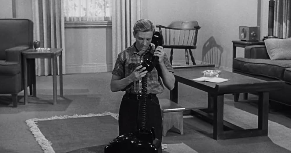 縮みゆく人間の画像