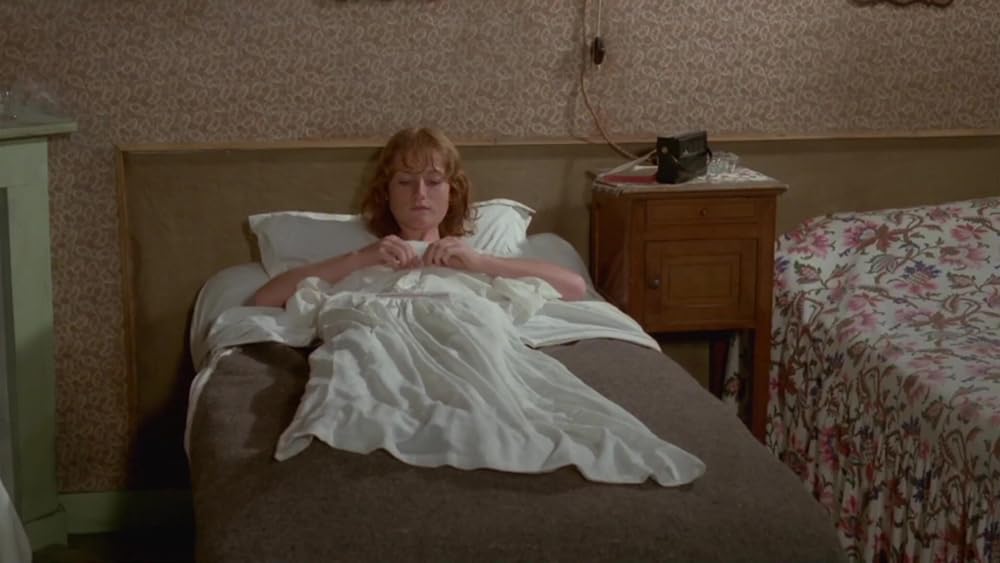 レースを編む女の画像