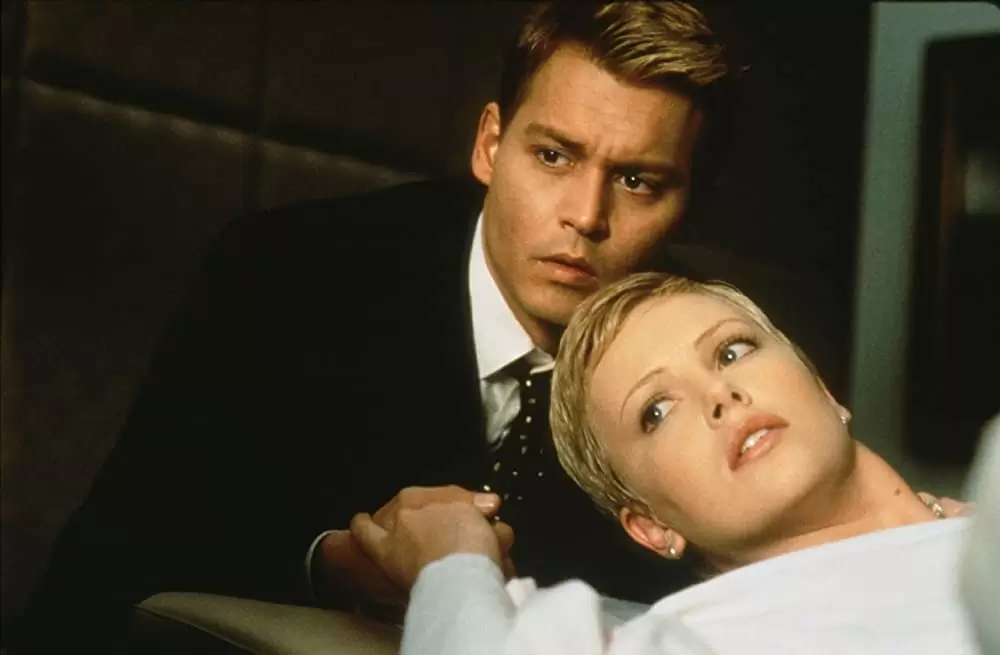 「ノイズ」ジョニー・デップ & シャーリーズ・セロンの画像