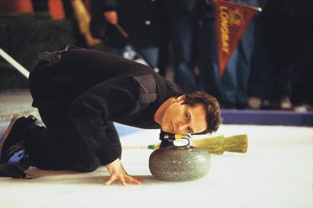 レスリー・ニールセンの 裸の石（ストーン）を持つ男の画像