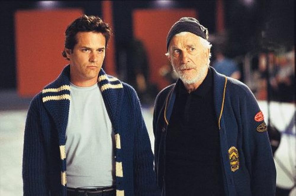 レスリー・ニールセンの 裸の石（ストーン）を持つ男の画像