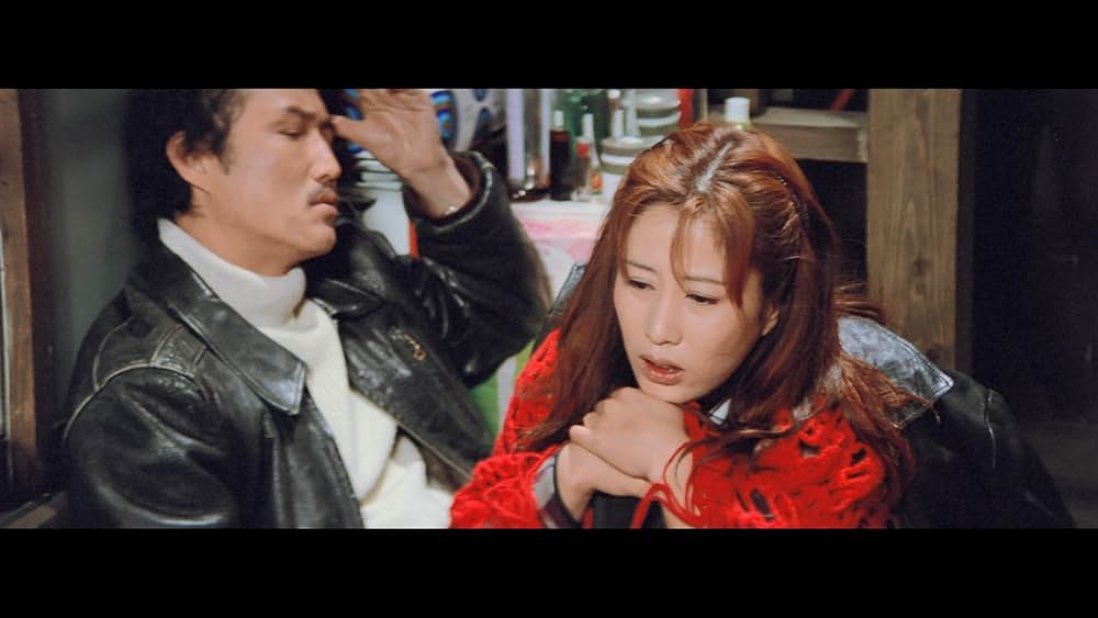 赫い髪の女の画像