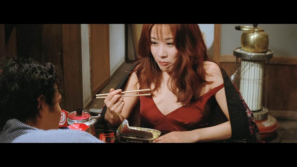 赫い髪の女の画像