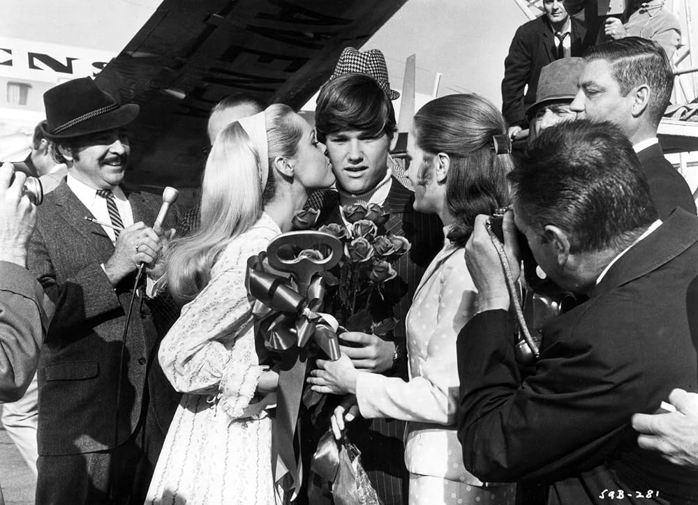 テニス靴をはいたコンピューターの画像