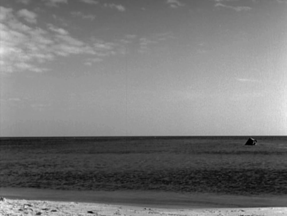 タンスと二人の男の画像