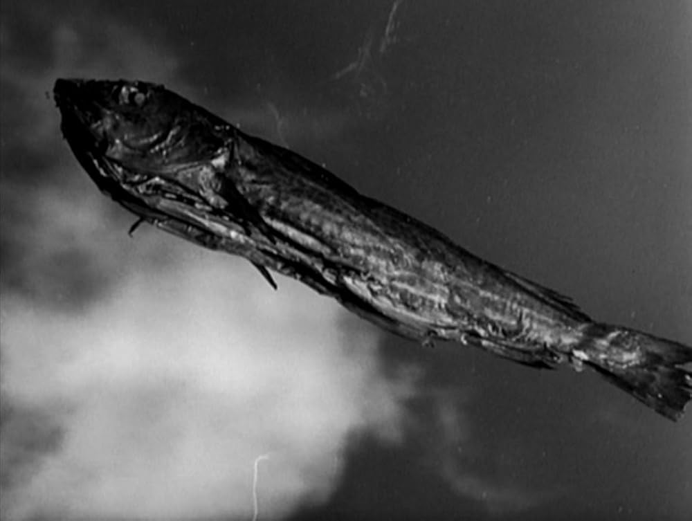 タンスと二人の男の画像