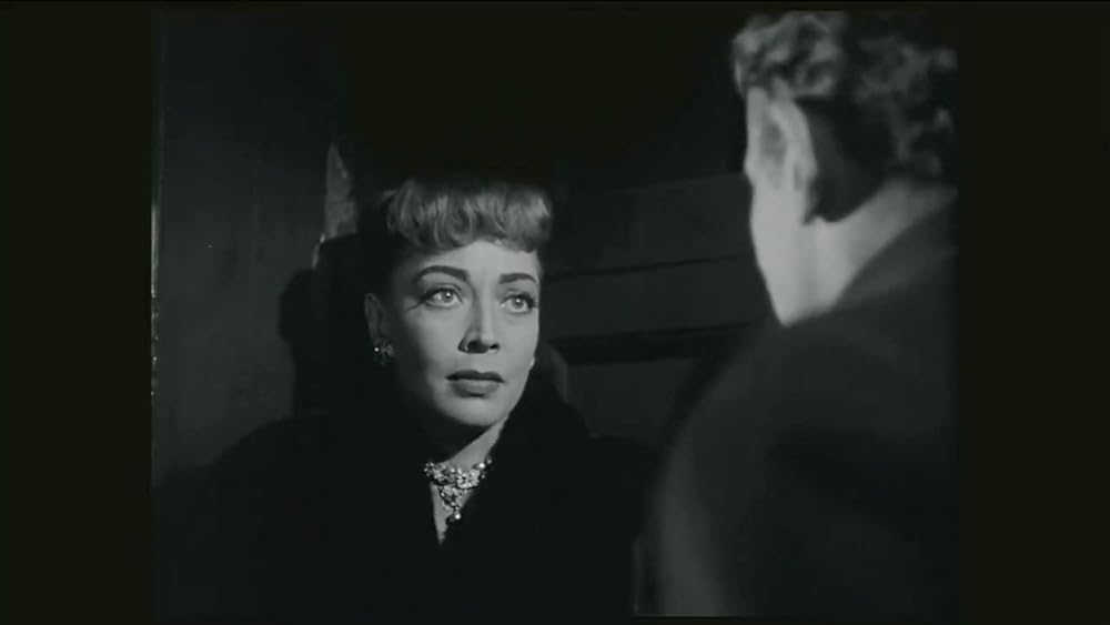 眠りなき街の画像