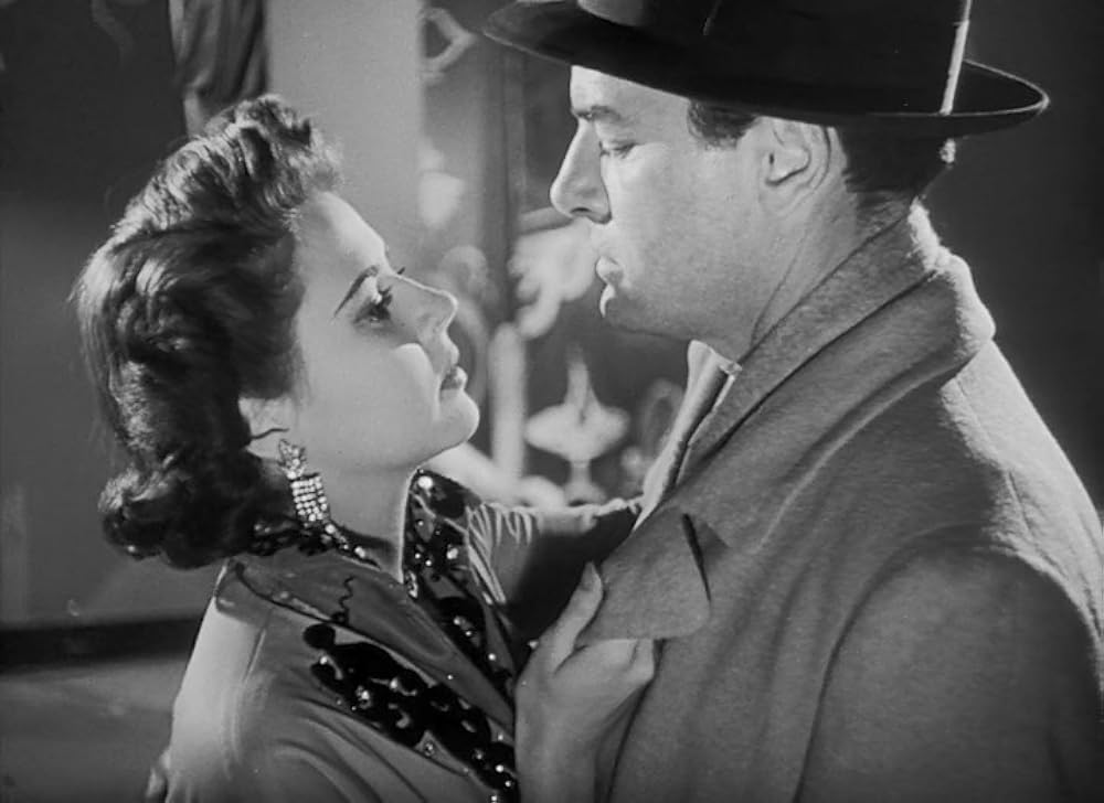 眠りなき街の画像