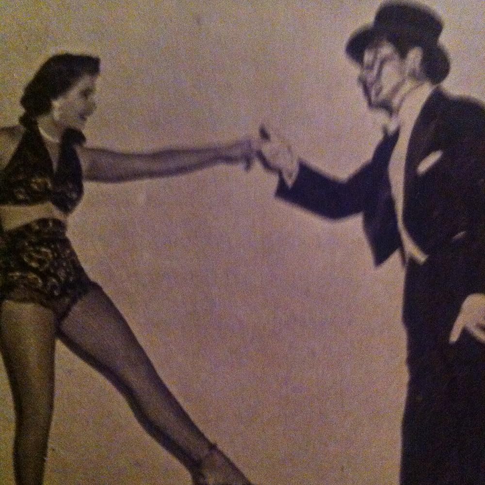 眠りなき街の画像