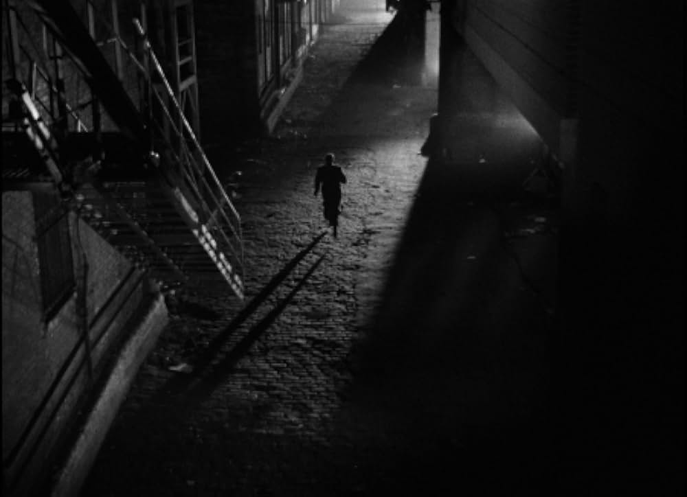 眠りなき街の画像