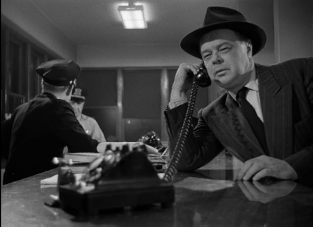 眠りなき街の画像