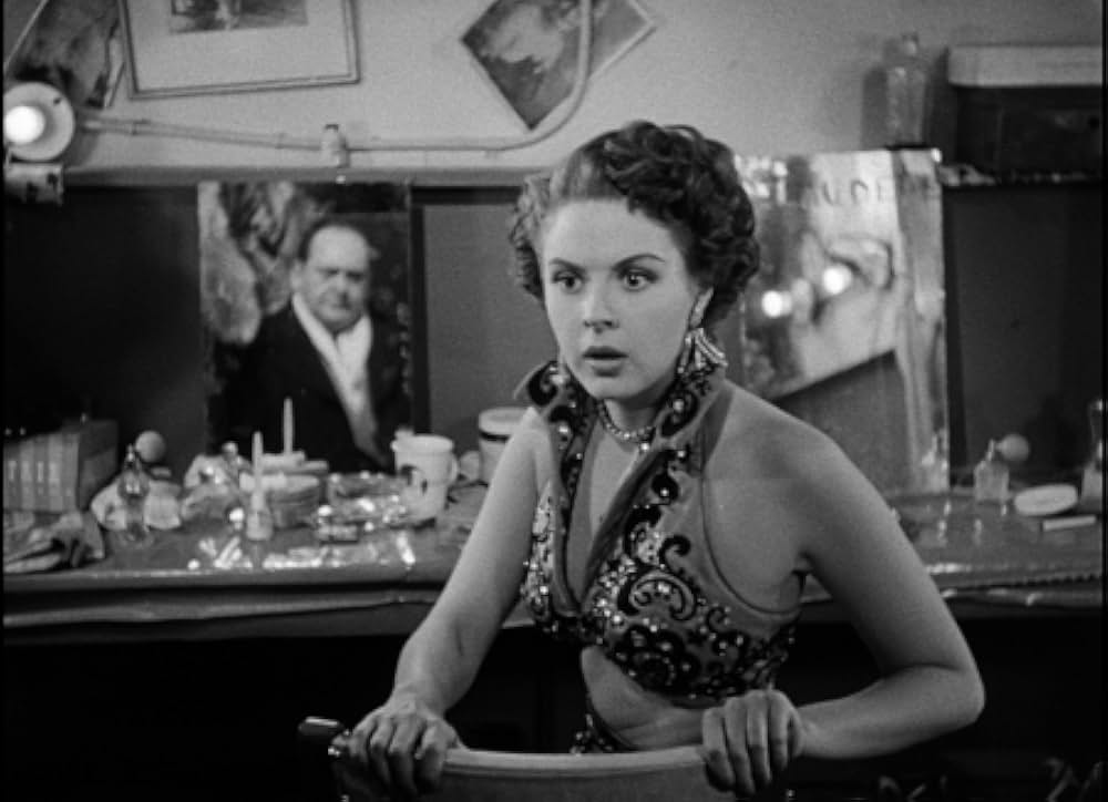 眠りなき街の画像