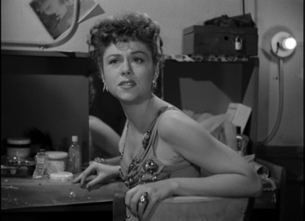 眠りなき街の画像