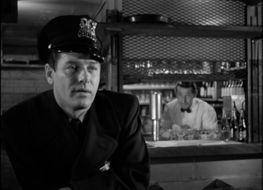 眠りなき街の画像